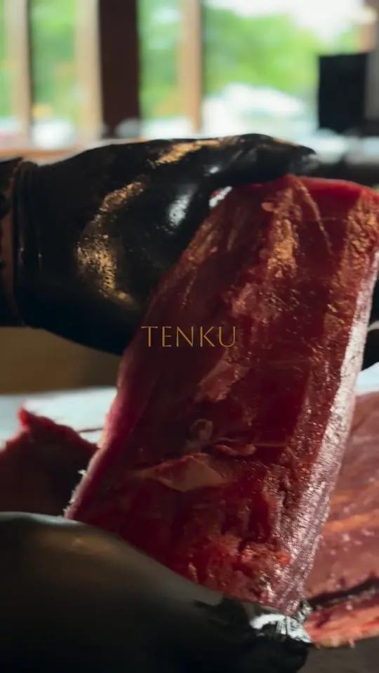 TENKU Sushi in Woodstock showing food, premium wild caught tuna, video by TENKU Sushi on Facebook