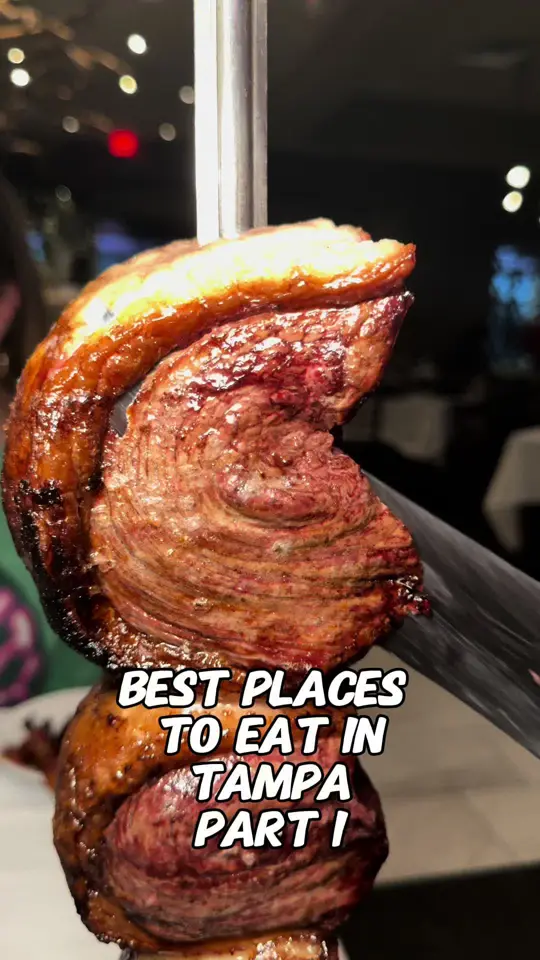 Terra Gaucha Brazilian Steakhouse - Tampa in Tampa showing review, churrasco, hot and cold table, fruit, rice, beans, breads, cheeses, salads, brazilian cheese bread, mashed potatoes, polenta, fried bananas,, video by foodyfellowship on TikTok