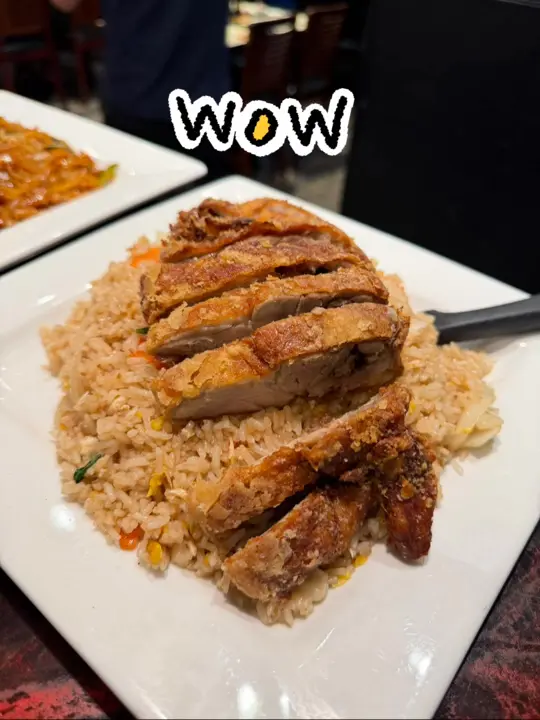 Thai Bayside in Palm Bay showing crispy duck, fried rice, video by Thai Bayside on Facebook