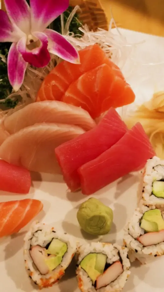 Thai Garlic & Sushi in Sunrise showing sashimi, sushi bar, video by Thai Garlic & Sushi on Facebook