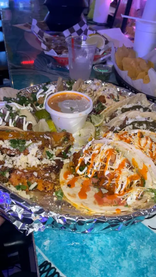  in Florida showing food, tacos, platters, video by The Hughley’s on Facebook