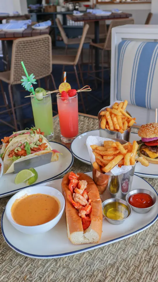 The Big Ketch Saltwater Grill - Buckhead in Atlanta showing review, lobster dip, fried lobster tacos, spicy tuna crispy rice, beach house double cheeseburger, video by Eating Through Atlanta on Facebook