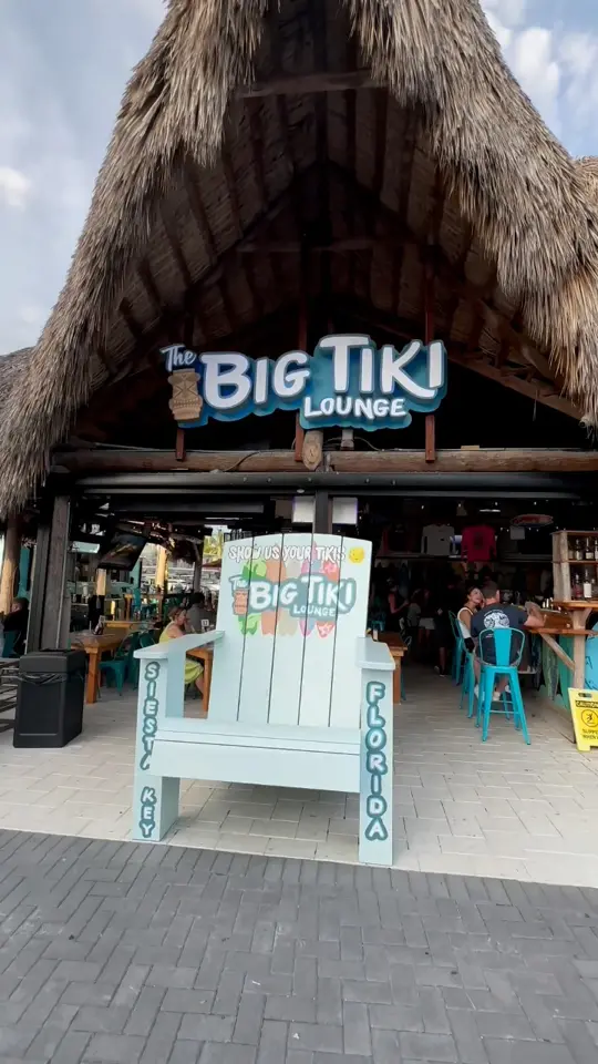 The Big Tiki Lounge in Sarasota showing cocktail, tropical cocktails; food, beach bites; atmosphere, tiki hut; event, live music, video by Things To Do Tampa Bay on Facebook