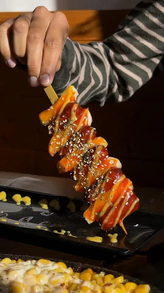 The Bite of Korea in Tucker showing food, hallabang! hallabong!, sodduk skewer, corn cheese, vegan korean fried portabella, creamy onion kfc, pajeon, video by Welcome to Atlanta's DeKalb County on Facebook