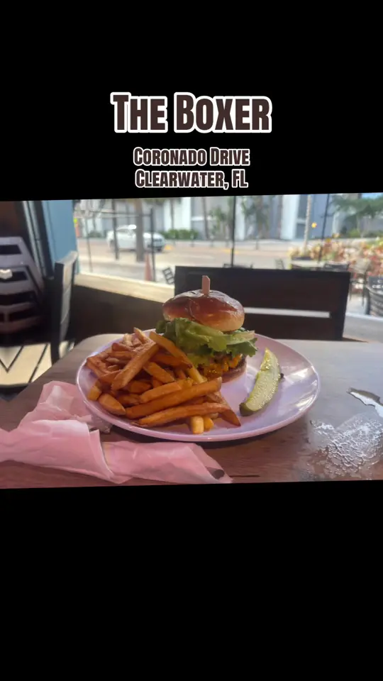 The Boxer Clearwater in Florida showing food, bavarian pretzel, wings, shrimp, smashburger, video by greeneyesnc on TikTok