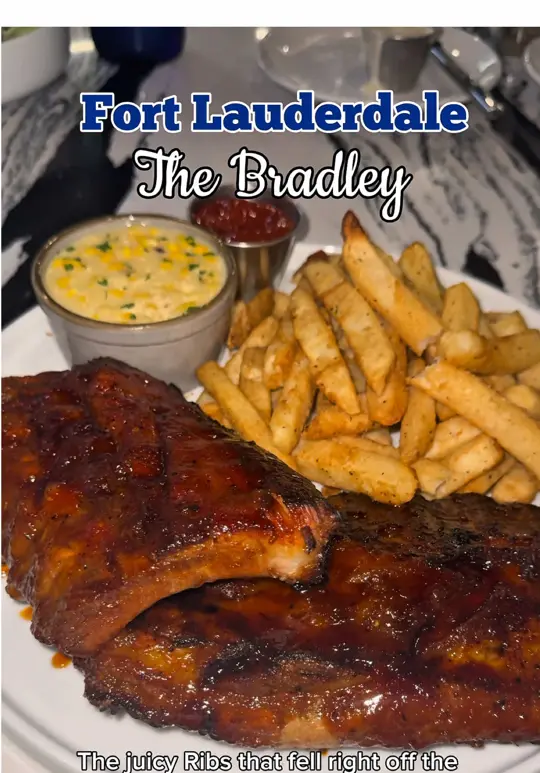 The Bradley Kitchen + Bar in Fort Lauderdale showing food, chili orange brussels, colossial shrimp, charred lemon caesar, cod fish, ribs & fries, key lime cheesecake, video by ms.soflo on TikTok