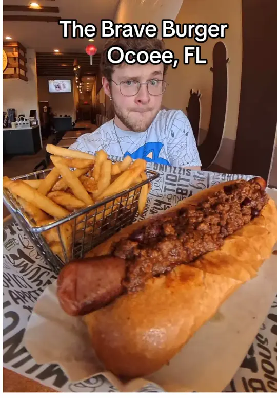 The Brave Burger Oviedo in Oviedo showing burger, fries, chili dog, milkshake, food review, video by itsryansreview on TikTok