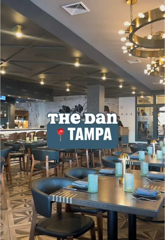 The Dan in Tampa showing review, visit, food, citrus hummus, branzino, emerald kale & chicken salad, key lime cheesecake, truffle sacchetti, video by sunkissedintampa on TikTok