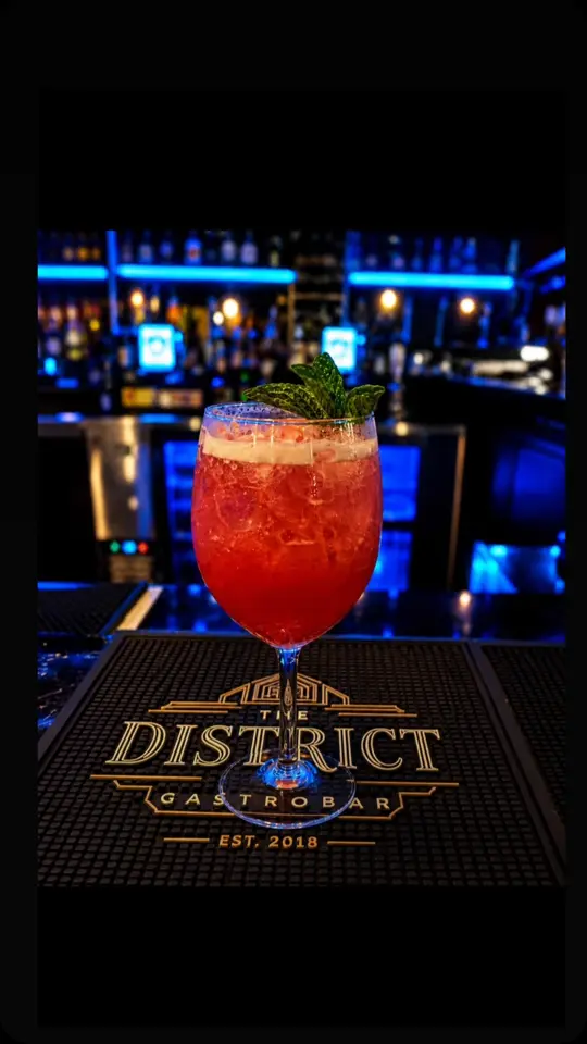 The District GastroBar in Orlando showing happy hour, $15 red thai curry mussels, $5 house wines, video by The District Gastrobar Orlando on Facebook