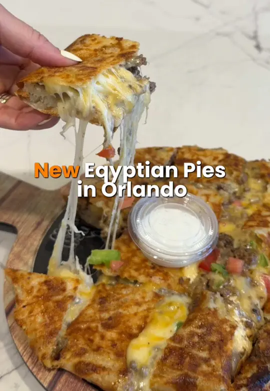  in Florida showing egyptian pizza, creative pizzas, feteers, meat platters, dessert pies, video by cheatdayorlando on TikTok