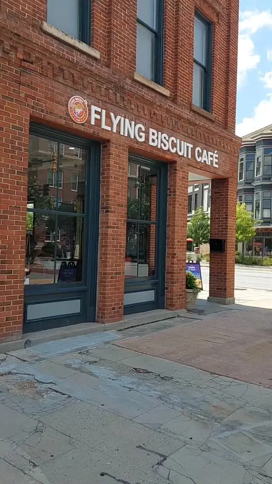 The Flying Biscuit Cafe in Macon showing restaurant opening, all day breakfast, brunch, lunch, menu items, beignet donuts, hangover hash, freebird benedict, dirty bird nashville hot chicken and w, video by Middle Georgia Times on Facebook