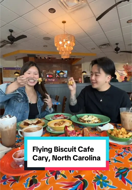 The Flying Biscuit Cafe in The Villages showing food review, strawberry french toast, red velvet pancake special, dirty bird chicken and waffles, hangover hash, shrimp and grits, video by lindaeatsworld on TikTok