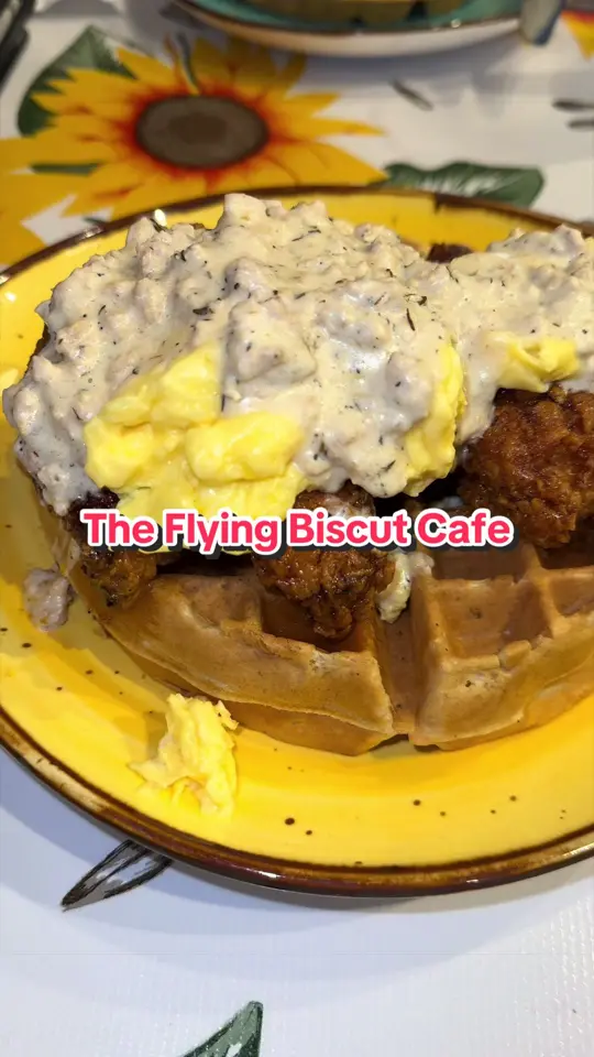 The Flying Biscuit Cafe in The Villages showing food, dirty bird chicken and waffles, grits, moondust potatoes, video by zackinthesouth on TikTok