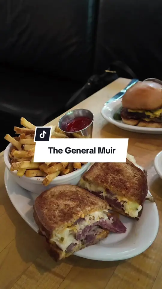 The General Muir in Atlanta showing food review, pastrami poutine, burger, reuben sandwich, free bagels, video by grace.jjang on TikTok