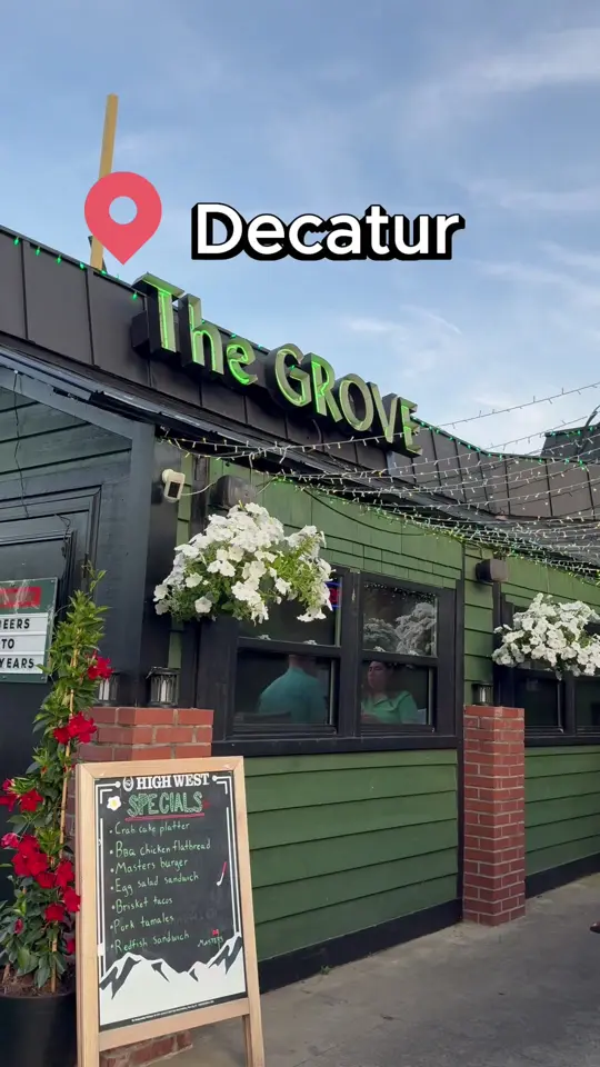 The Grove Restaurant & Tavern in Decatur showing patio, bar atmosphere, chicken caesar wrap, video by thatsawrapatl on TikTok