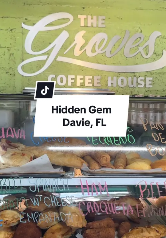 The Groves Coffee House in Davie showing smoothies, juice, coffee bar, açaí bowls, breakfast sandwiches, key lime pie, video by _chelsealauren_ on TikTok