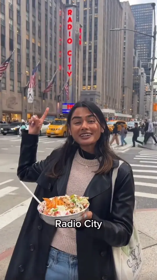 The Halal Guys in Chamblee showing food, chicken + gyro over rice platters, beef & lamb gyro platter, beef & lamb gyro sandwich, waffle fries, loaded waffle fries, video by The Halal Guys on Facebook
