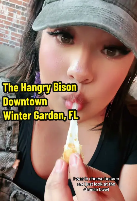 The Hangry Bison in Orlando showing burgers, drinks, ambiance, video by holographicmami on TikTok