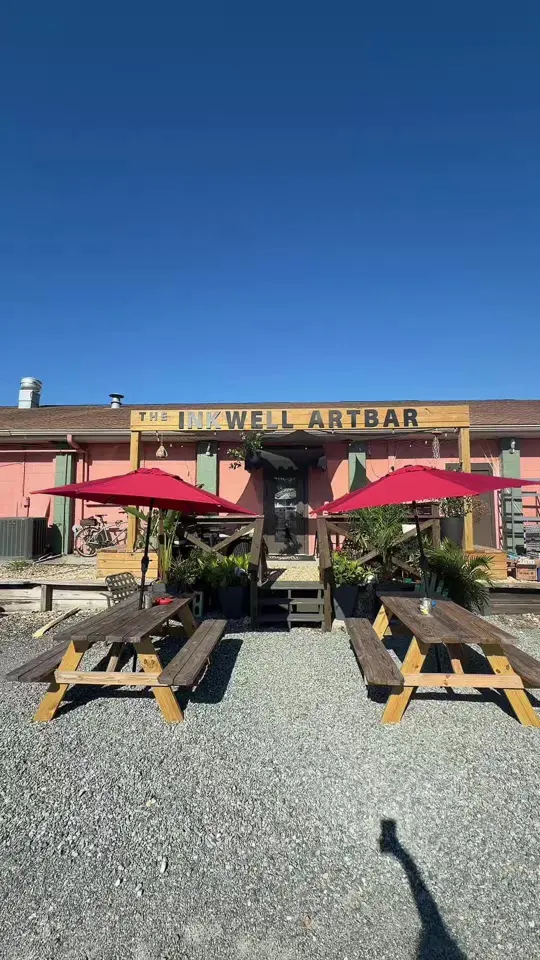 The Inkwell Art Bar in Fernandina Beach showing open mic, ethica chaos fest, second sunday songwriters event, outdoor seating, expanded stage, video by theinkwellamelia on TikTok