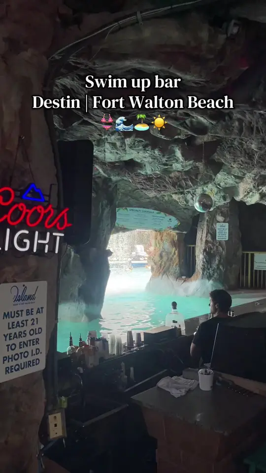 The Island Resort Beach Bar in Fort Walton Beach showing swimup bar, grotto, video by omgitsbeba on TikTok