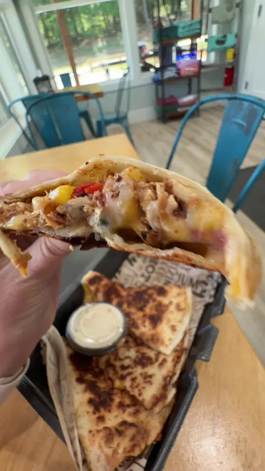 The Jax Shack in Homer showing lunch, loaded quesadillas, house sauce, sweet tea, homemade cheesecake, video by mountainsandmain on TikTok
