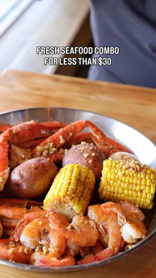 The Juicy Crab Albany in Albany showing seafood combo, crab legs, shrimp, corn, potatoes, video by The Juicy Crab - Albany GA on Facebook