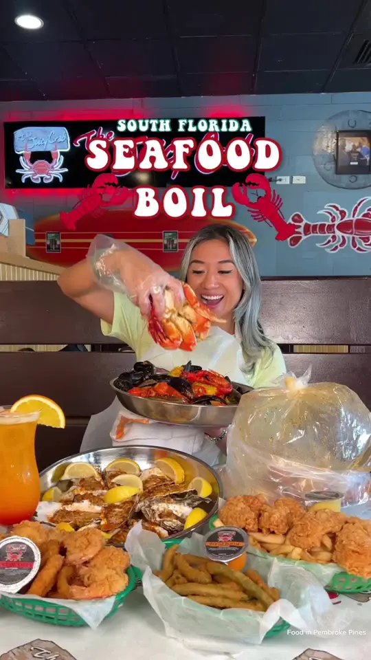 The Juicy Crab in Pembroke Pines showing seafood boil, crab, shrimp, squid, deal, video by explorewithgg on TikTok