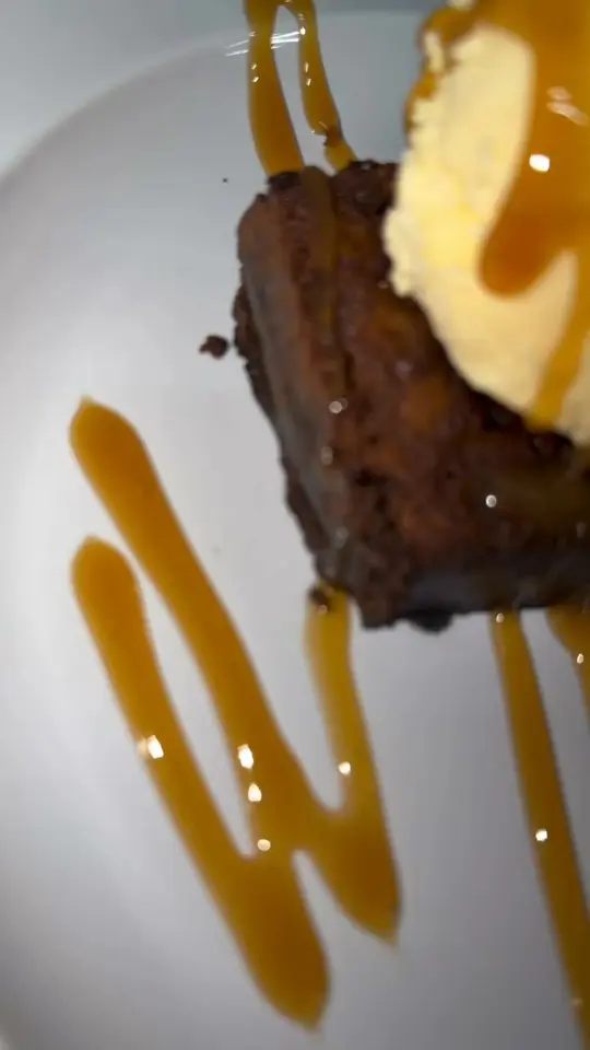 The Junction Sports Bar And Grill in Carrollton showing food, fudge brownie with vanilla ice cream and caramel drizzle, live music, video by The Junction Sports Bar and Grill on Facebook