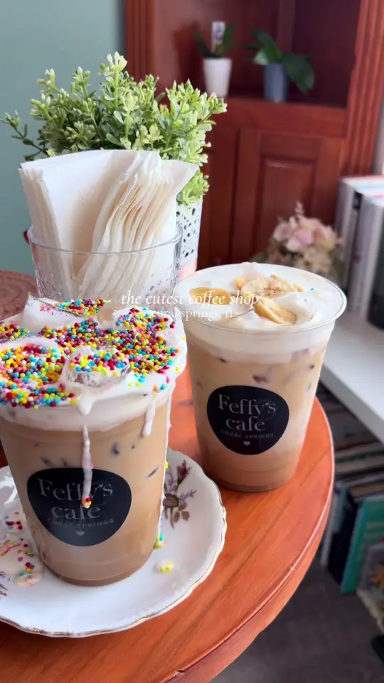 The Little Coffee Shoppe in Coral Springs showing coffee, dot cake latte, coffee, crazy monkey latte, food, ham and cheese baguette, food, chicken salad croissant, food, spinach empanada, video by olivia.tucker_ on TikTok