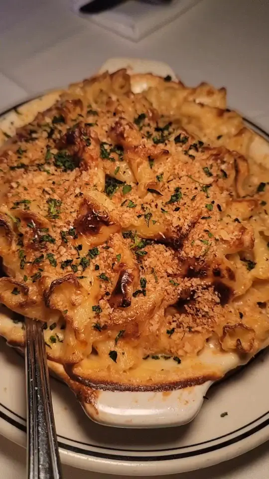  in Florida showing food, lobster macaroni & cheese, spicy blue crab capellini, chicken fried lobster, video by baloo_eats on TikTok