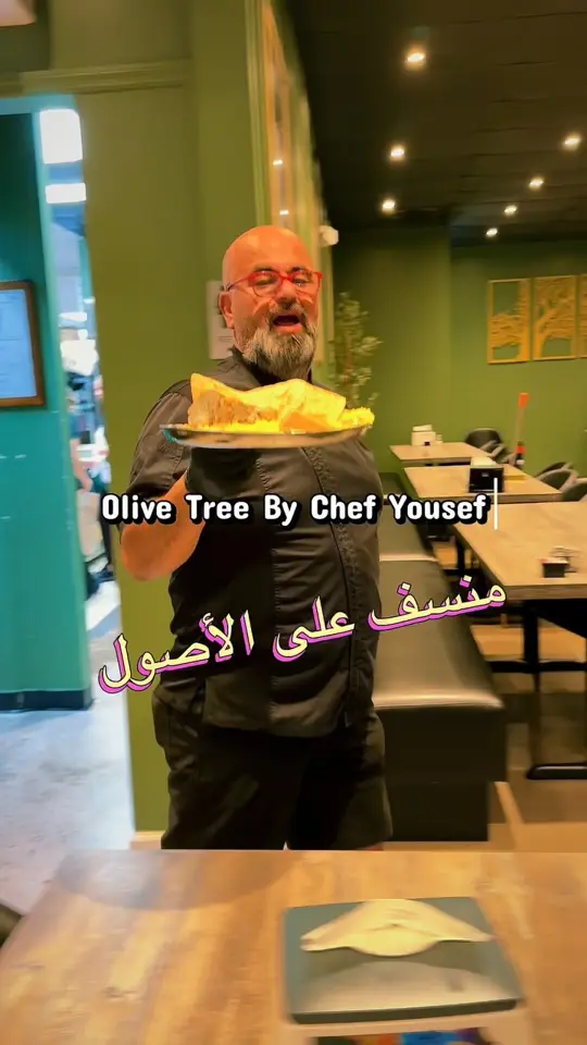  in Florida showing food, jordanian mansaf, shawarma, mixed kebabs, pita, hummus, video by عرب تامبا فلوريدا Arab Tampa Florida on Facebook