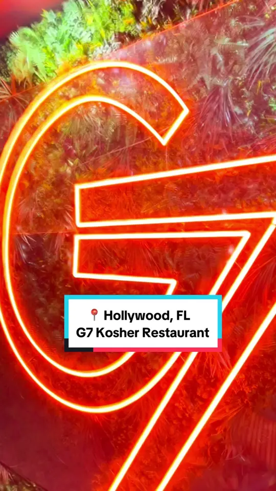 The Rooftop Bar in Destin showing beef negimaki, kimchi gyozas, beef fried rice with a sous vide egg, sticky bbq back ribs, 16 oz boneless aged ribeye, g7, video by srulycooks on TikTok