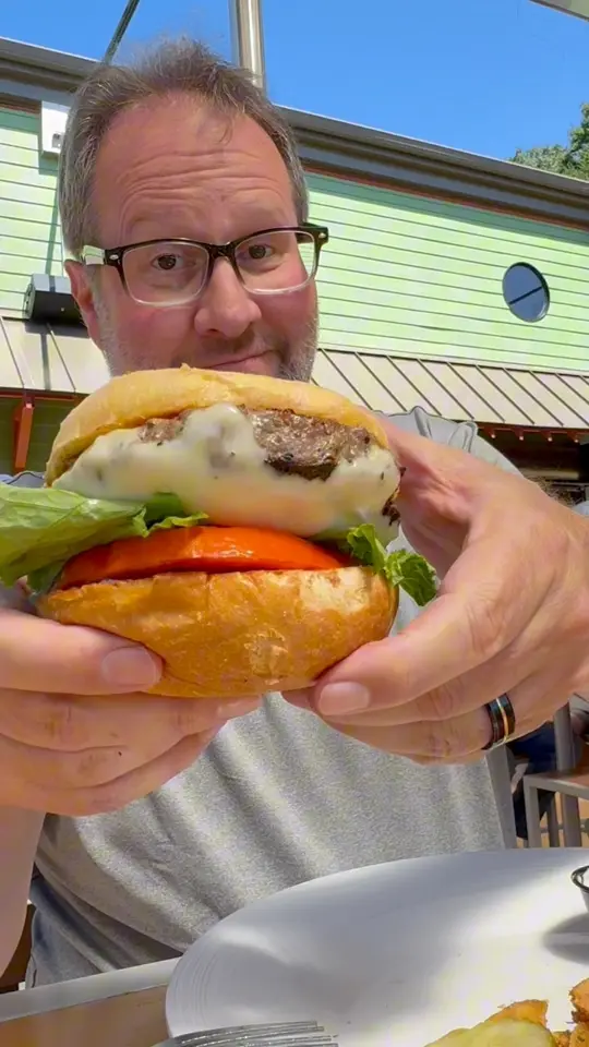 The Sandbar & Grille in Fort Myers showing visit, review, video by The Carolina Foodie on Facebook
