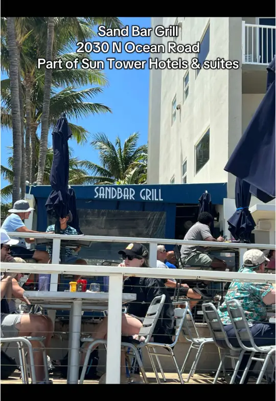The Sandbar & Grille in Fort Myers showing drink, oceanfront views, video by turtlenestbungalow on TikTok