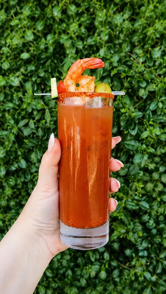 The Shrimp Factory in Savannah showing cocktail, bloody mary, video by The Shrimp Factory on Facebook