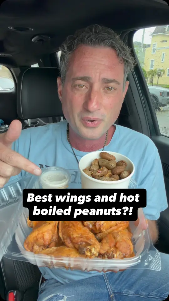 The Soho Backyard in Tampa showing chicken wings, hot boiled peanuts, video by Foodie Justice on Facebook