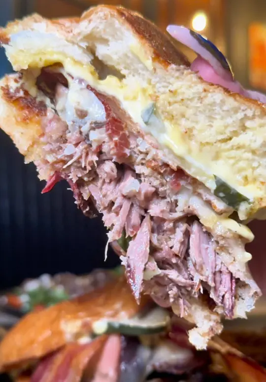 The Soho Backyard in Tampa showing restaurant review, burrata & arugula salad, backyard brisket cubano, brunch sandwich, video by eatlocalflorida on TikTok