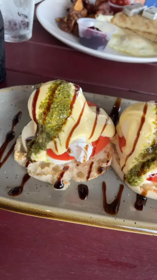 The Tini Martini Bar in St. Augustine showing cocktail, eggs benedict, video by charlottestiktok7 on TikTok