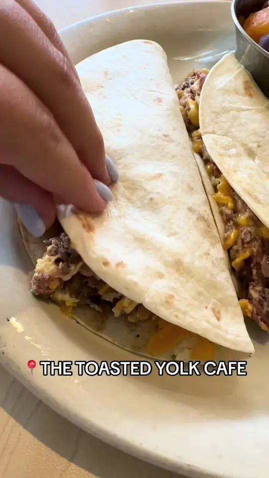 The Toasted Yolk Cafe on TikTok, video by thewoodlandsedition