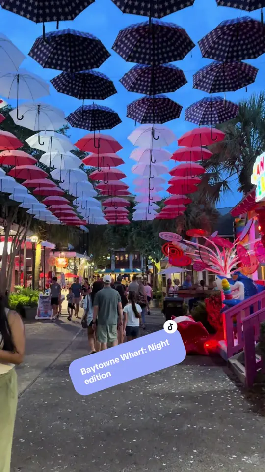 The Village of Baytowne Wharf in Miramar Beach showing live music, dj, food, chicken quesadilla, drink, margarita, video by brittanylambert03 on TikTok