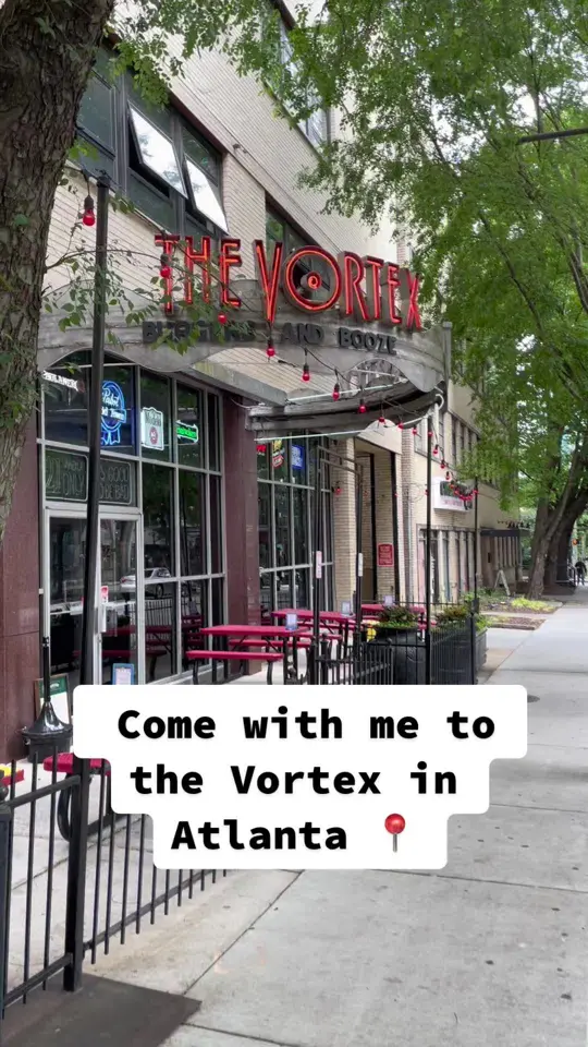 The Vortex Bar & Grill in Atlanta showing burger, drinks, visit, video by nikiatheceo on TikTok