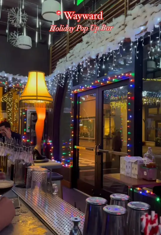 The Wayward in Savannah showing holiday-themed drinks, festive decor, popcorn cart, game room, video by visitsavannah on TikTok