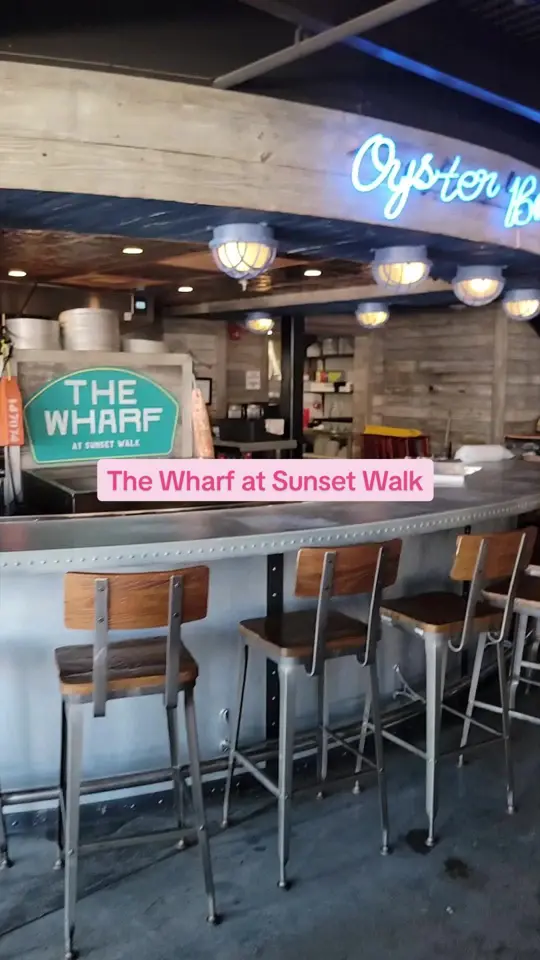The Wharf at Sunset Walk in Kissimmee showing oyster bar, fresh fish, seafood dishes, live music, happy hour, weekend brunch, video by orlandofamilyfun on TikTok