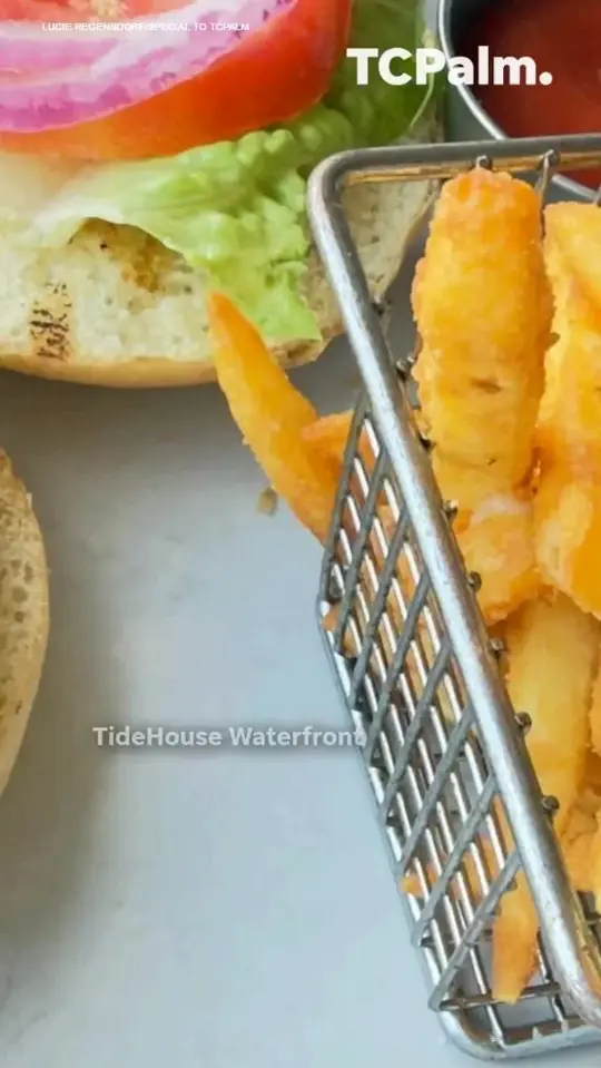 TideHouse Waterfront Restaurant in Stuart showing review, packed crab cakes, fish sandwiches, panoramic view of the st. lucie river, video by TCPalm on Facebook