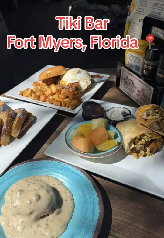Tiki Bar & Grill - Lighthouse Island Resort in Fort Myers Beach showing breakfast, breakfast burrito, salsa, sour cream, fruit bowl, video by chels_eats on TikTok