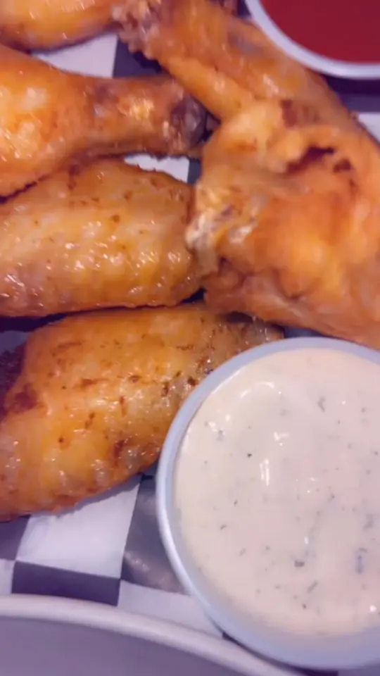 Tipsy Bar & Grill in Columbus showing review, visit, drinks, karaoke, wings, loaded tots, video by juicypeach10 on TikTok