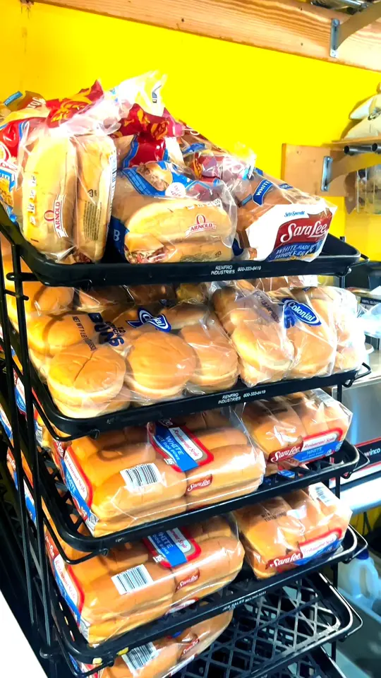 Tom's Hot Dogs in Panama City showing restaurant, hot dogs, video by The Mashburn Building on Facebook