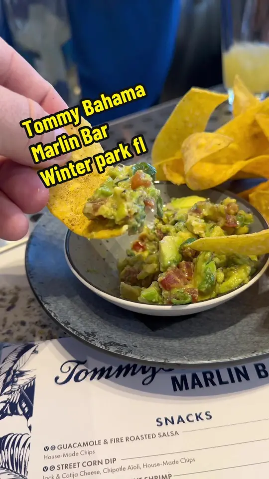 Tommy Bahama Marlin Bar in Fort Lauderdale showing review, visit, atmosphere, jerk rubbed wings, coconut shrimp, tacos, video by justpotus on TikTok