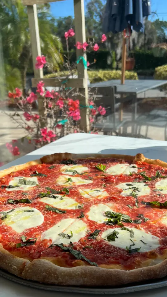 Tony's Pizza in Flagler Beach showing pizza, classic margherita, video by Tony's Pizza - Flagler Beach on Facebook