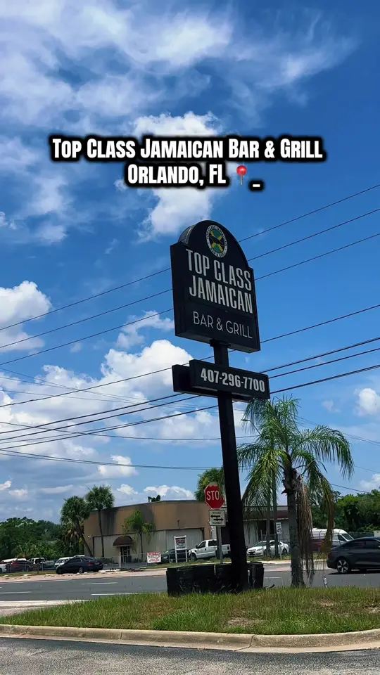 Top Class Jamaican Bar & Grill in Orlando showing review, visit, lychee mimosa, oxtail & grits, coconut shrimp tacos, video by vickiesflavas_ on TikTok